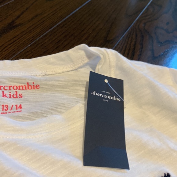 Here’s is 3 white Abercrombie top with tags in 1 that is very affordable! - Picture 6 of 6